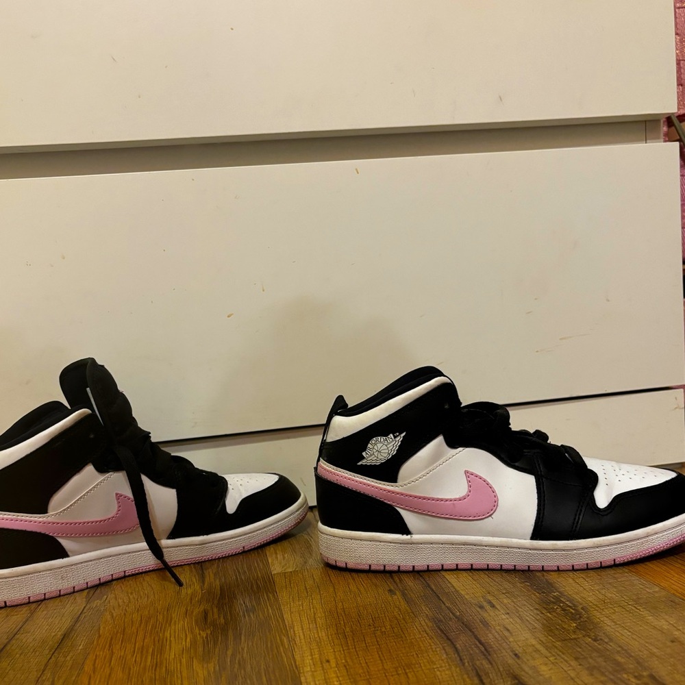 Pink, black and white Jordan air sneakers